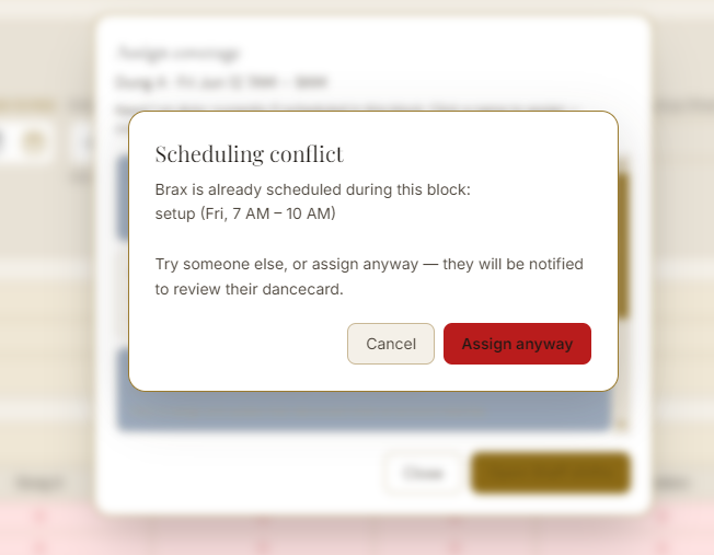 Scheduling conflict modal warning that staff is already booked during the block